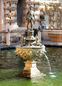 Statue of fountain in city