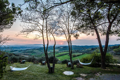 Scenic view of landscape against sky during sunset