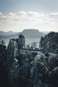 Scenic view of rock formations against sky