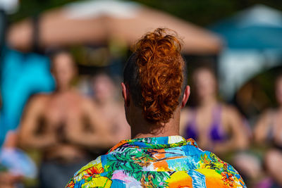 Rear view of people with multi colored outdoors