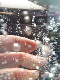 Close-up of raindrops on glass window