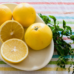 Close-up of fruits in plate on table