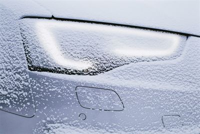 Aerial view of wet car window during winter