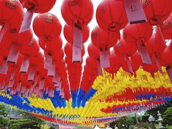 Low angle view of colorful chinese lanterns hanging outdoors