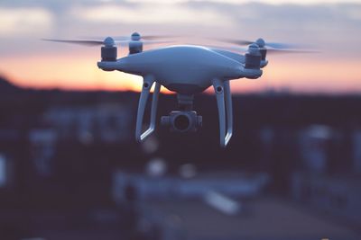 Close-up of drone against sky