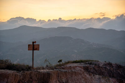 Scenic view of mountains against sky during sunset