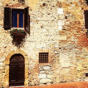 View of window on brick wall