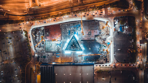 Aerial view of illuminated construction site