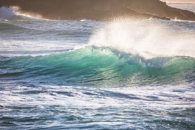 Sea waves splashing on shore