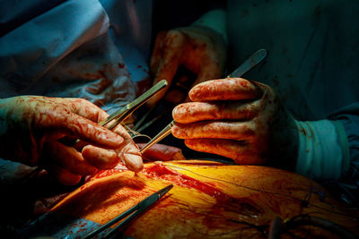 Close-up of man preparing food