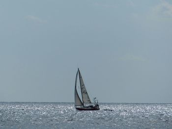 Boats sailing in sea