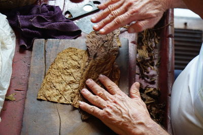 Close-up of hands preparing food