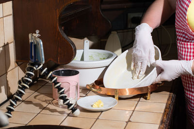 Woman cooking spinach muffin step by step, making french shirt in baking dish