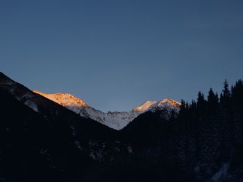 Scenic view of mountains against clear sky