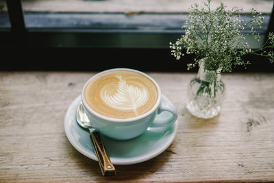 Coffee cup on table