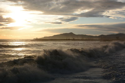 Scenic view of sea against sky during sunset