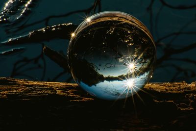 Close-up of crystal ball on water