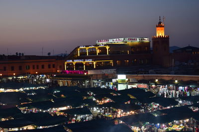 High angle view of illuminated buildings at night