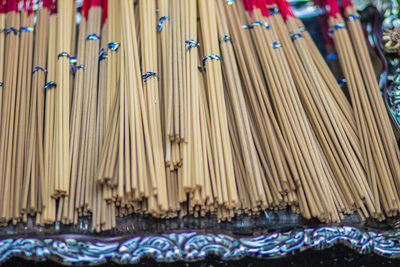 High angle view of incense sticks at market stall