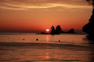 Scenic view of sea against sky during sunset