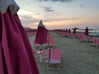 Scenic view of beach against sky during sunset