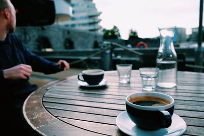 Close-up of coffee cup on table