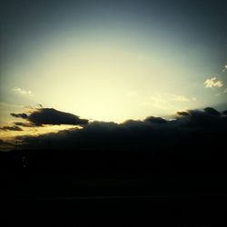 Scenic view of landscape against sky at sunset