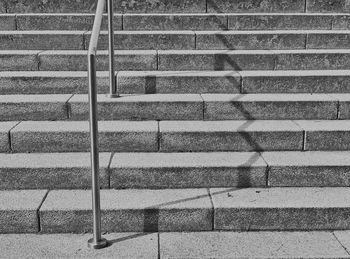 High angle view of shadow on staircase in city