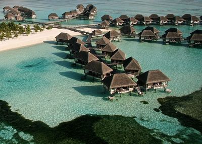 High angle view of slit houses at tourist resort in sea