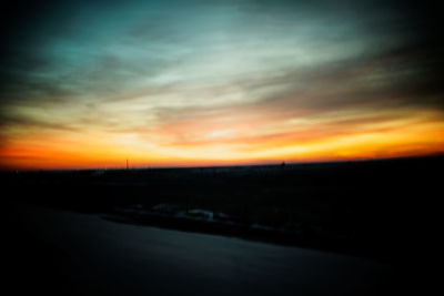 Scenic view of landscape against sky during sunset