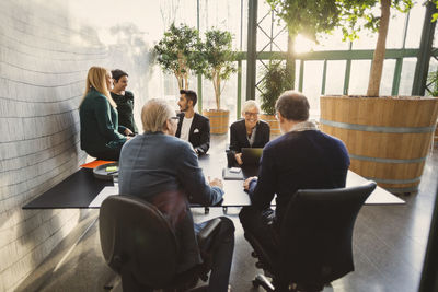 Team of creative business people discussing in office