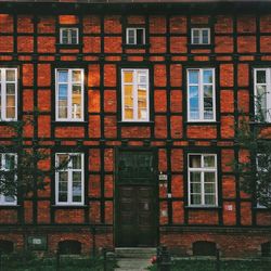 Brick wall with buildings in background