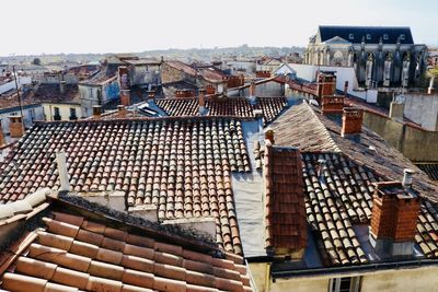 High angle view of buildings in city against clear sky