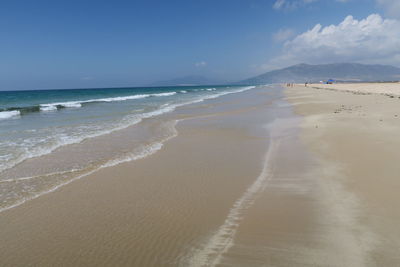 Scenic view of beach against sky