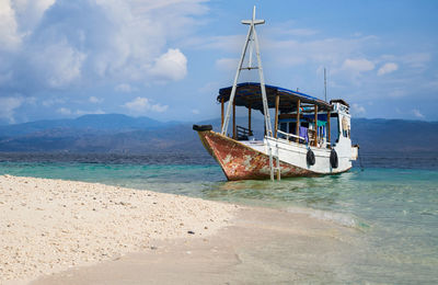 View of sailboat in sea against sky