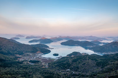 High angle view of mountains against sky during sunset