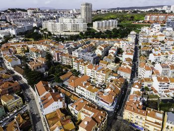 High angle view of street and buildings in city