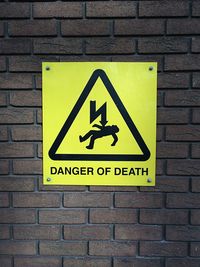 Close-up of sign on wall