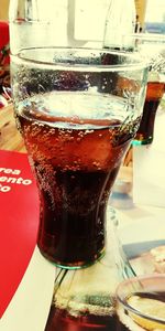 Close-up of beer glass on table