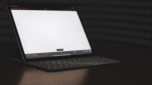 Close-up of laptop on table