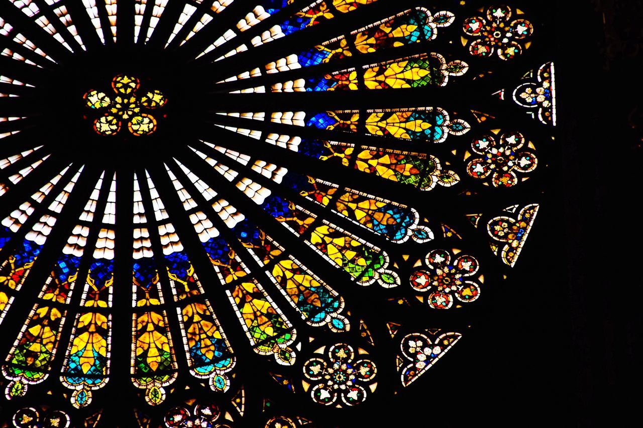 stained glass, glass, indoors, multi colored, design, pattern, architecture, shape, no people, geometric shape, built structure, place of worship, window, low angle view, religion, art and craft, circle, belief, ornate, spirituality, ceiling, floral pattern, directly below, architecture and art