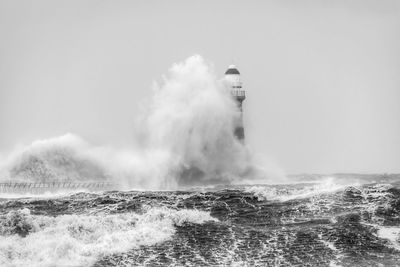 Panoramic view of sea against clear sky