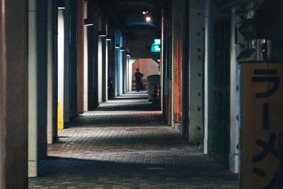 Illuminated corridor of building