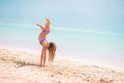 Full length of woman on beach