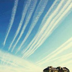 Aerial view of vapor trails in sky