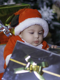 Portrait of cute boy looking away