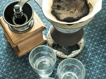 High angle view of coffee cups on table