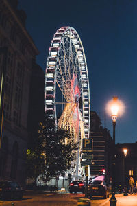 Nightlife in brussels, belgium. the view, big wheel is a famous attraction in the capital of belgium