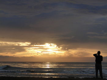 Scenic view of sea at sunset