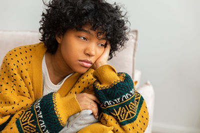 Young woman holding gift